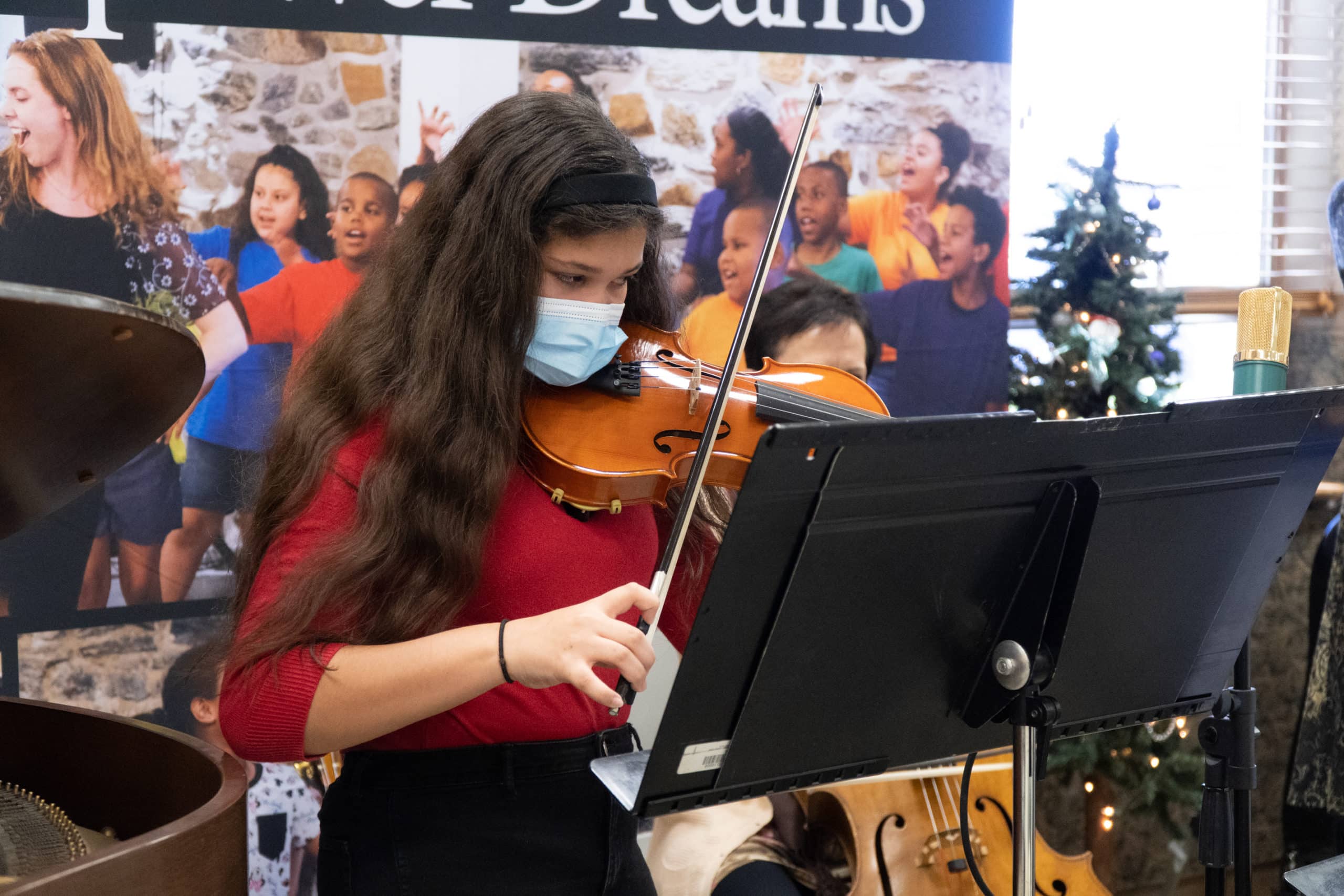 girl performing on viola